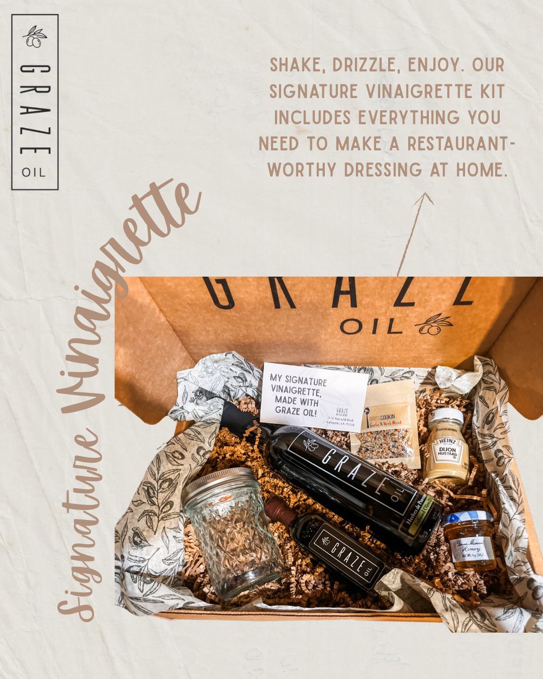 A branded Graze Oil gift box shown open, filled with a vinaigrette kit including a bottle, jars, and a mason jar, surrounded by kraft paper and foil. The image includes promotional text and the words 'Signature Vinaigrette' on a beige textured background. , with a sign reading 'MY SIGNATURE VINAIGRETTE, MADE WITH GRAZE OIL!'.